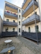 Innenhof - Hochwertige 3 Zimmerwohnung mit Fußbodenheizung und Balkon A+