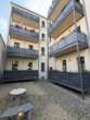 Innenhof - Hochwertige 3 Zimmerwohnung mit Fußbodenheizung und Balkon