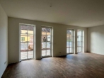 Wohnzimmer - Modernes Reihenendhaus – 4 Zimmer mit Garten, Wärmepumpe und zwei Stellplätzen