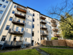 Rückansicht - 5,5 % Sonder AfA +++ 4 Zimmerwohnung mit Balkon und eigenem Gartenanteil