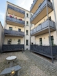 Innenhof - Hochwertige 3 Zimmerwohnung mit Fußbodenheizung und Balkon A+
